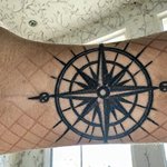 tatouage rose des vents