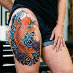 tatouage-femme-cuisse-couleur