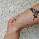 tatouage-jambe-papillon